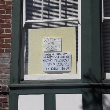Alameda Post - upside down sign in window
