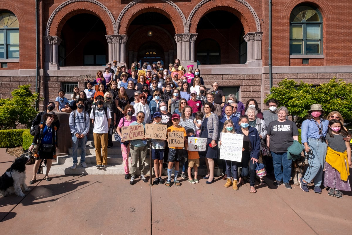 Alameda Post- Photo of people gathered on City Hall steps in Alameda, CA in support of women's reproductive rights.