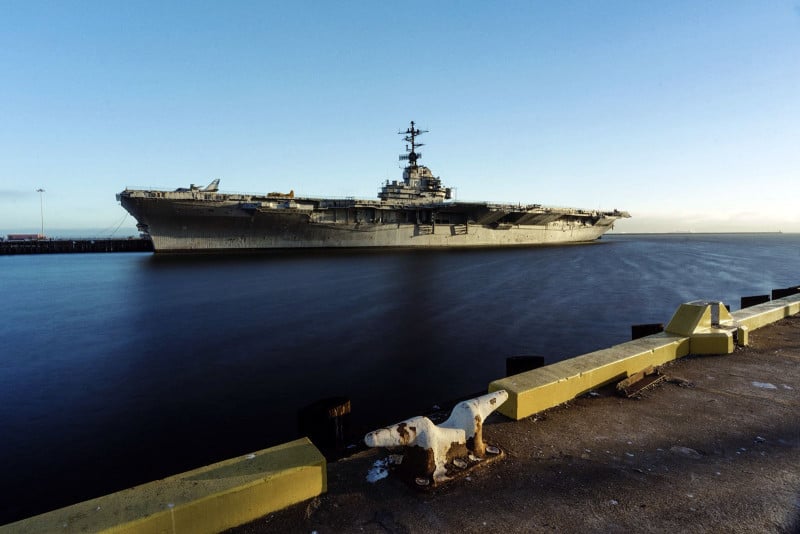 Alameda Post - USS Hornet alone at its pier