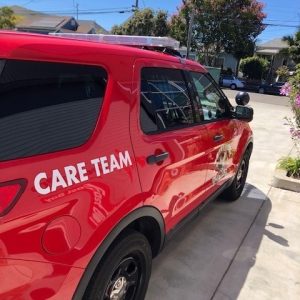 Alameda Post - Alameda CARE Team Vehicle, a red midsize SUV