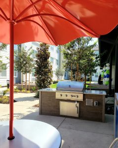 Alameda Post - a grill and patio area at Rosefield Village