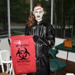 Alameda Post - a child in a zombie costume, including fake blood on the forehead