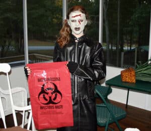 Alameda Post - a child in a zombie costume, including fake blood on the forehead