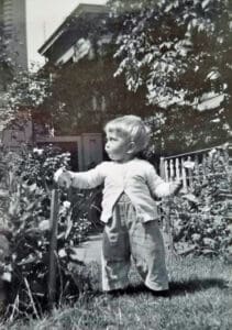 Alameda Post - a photo of a toddler in the backyard of the house