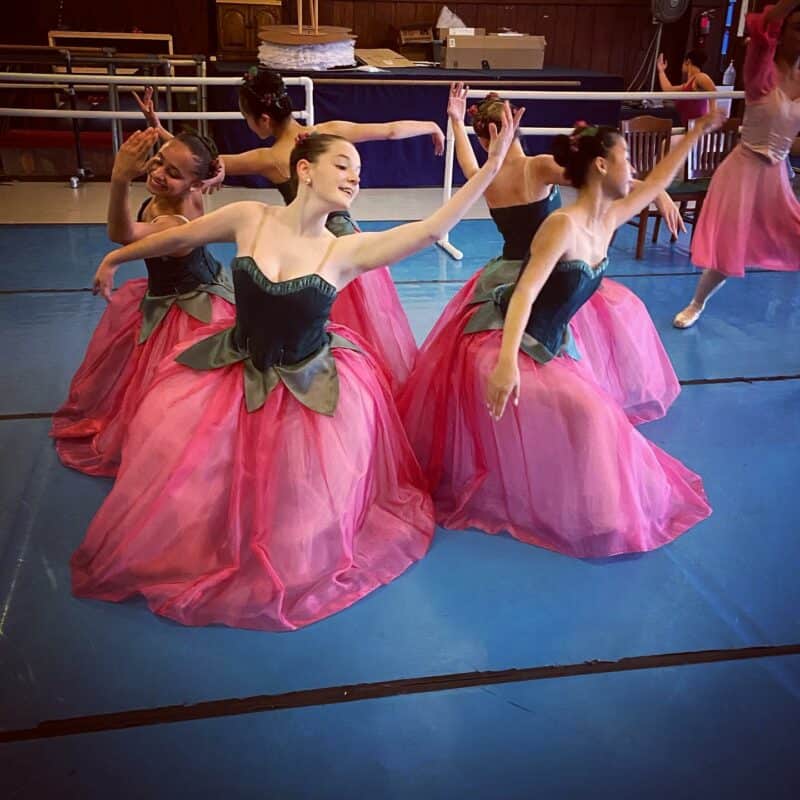 Alameda Post - ballerinas in whimsical costumes practice in a practice room