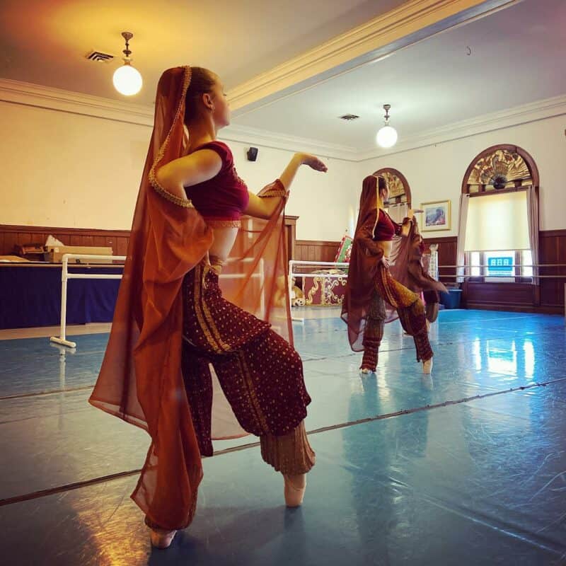 Alameda Post - dancers in a practice room with costumes 