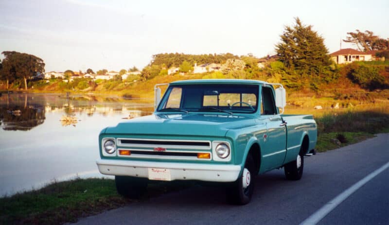 Alameda Post - a blue1967 Chevrolet C10 Pickup Truck next to the water