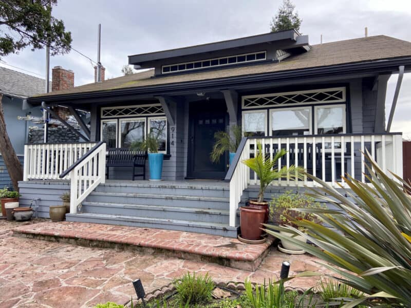 Alameda Post - a modern photo of a small one story home with a porch