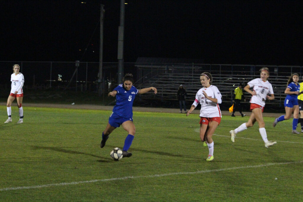 Alameda Post - a soccer player prepares to kick a ball