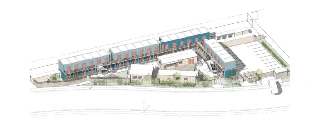 Alameda Post - a birds eye view of Dignity VIllage. There is a long two story wall of small apartments and a few shorter buildings in the middle. It is up next to a road, and there's a small parking lot. The whole development is i the shape of a very tall, thin right triangle.