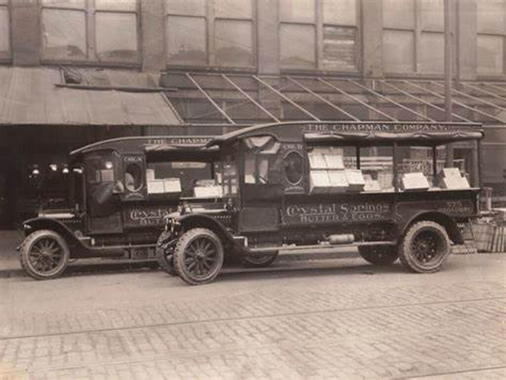 Alameda Post - an old photo of an egg delivery truck in a city