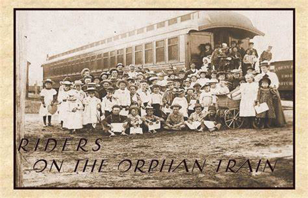 Alameda Post - an old photo of a lot of children by a train. It is an orphan train, like that which Queenie Bobo rode