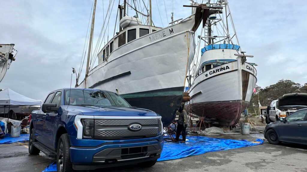 Alameda Post - a Ford next to fishing boats