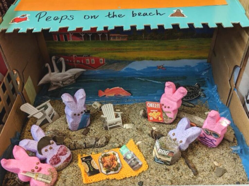 Alameda Post - a Peeps Diorama with the small marshmallow bunnies on a sandy beach in a box