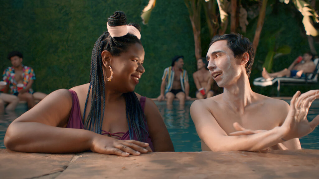 Alameda Post - a man and woman in a pool smile at each other