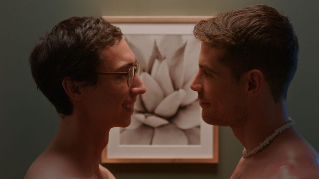 Alameda Post - a close up of two men standing face to face shirtless