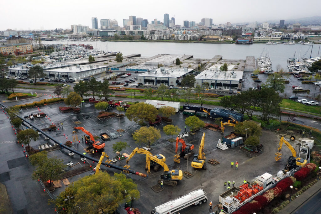 Alameda Post - EBMUD sets up pipe for the Inner Harbor Crossing along Marina Village Parkway before installation.