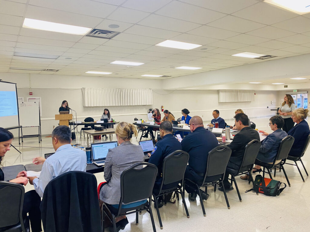 Alameda Post - City Council holds its second public workshop on developing a three-year Strategic Plan. People in chairs sit around a room that looks like a classroom or conference room and listen to a presenter