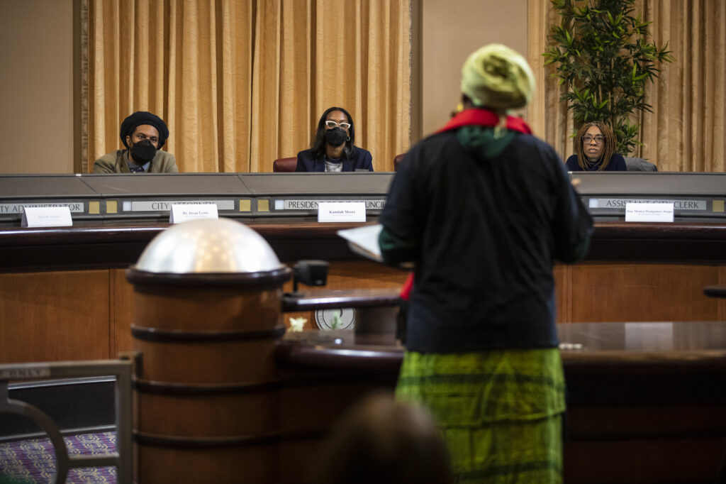 Alameda Post - Task Force members listen during the public comment portion of the AB 3121 Task Force to Study and Develop Reparations Proposals for African Americans meeting in Oakland on Dec. 14, 2022. Photo by Martin do Nascimento, CalMatters