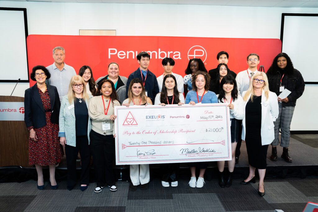 Alameda Post - Recipients of scholarships pose with Chamber officials and the mayor at the Chamber Foundation Scholarships ceremony May 15, 2023. Photo by Maurice Ramirez.