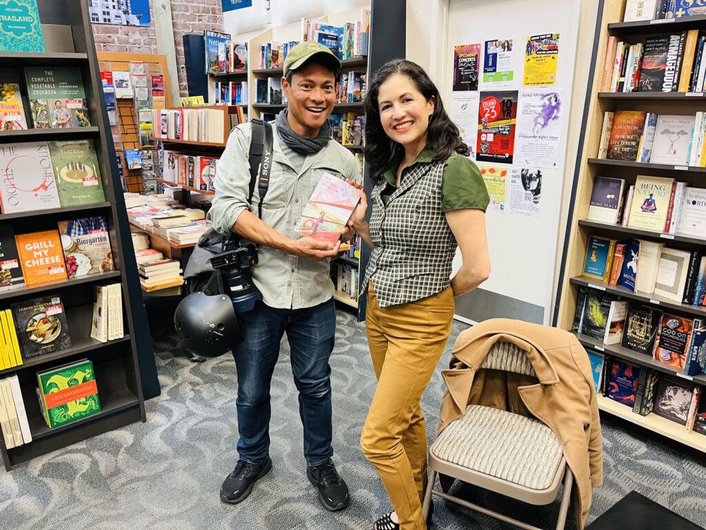 Alameda Post - Karin Jensen and Maurice Ramirez pose in Books Inc for a photo