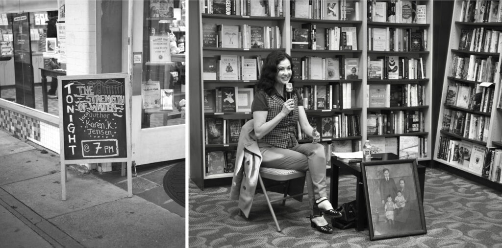 Alameda Post - the sign in front of Books Inc. announcing The Strength of Water book signing and Karin sitting in a chair at the front of the event holding a microphone next to a family portrait