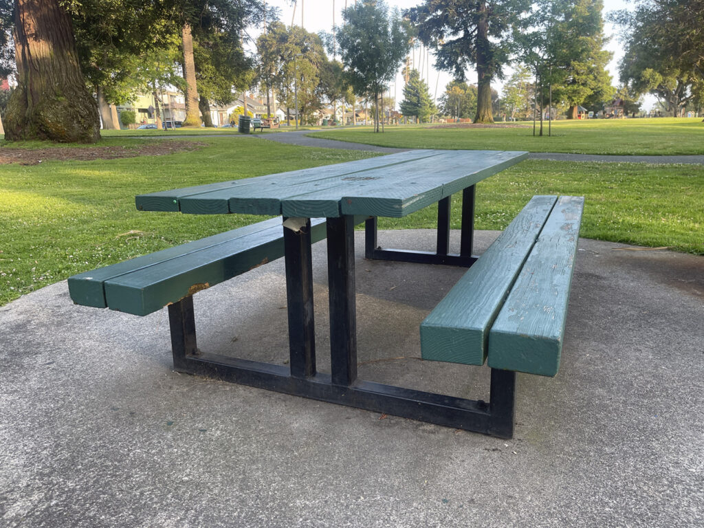 Alameda Post - Bear's-Eye View of Alameda for June 5, 2023 — a wooden picnic table painted green