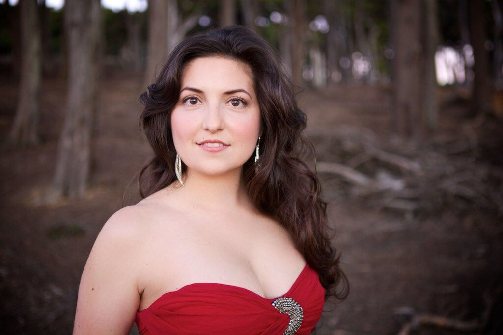Alameda Post - Chelsea Hollow in a red gown