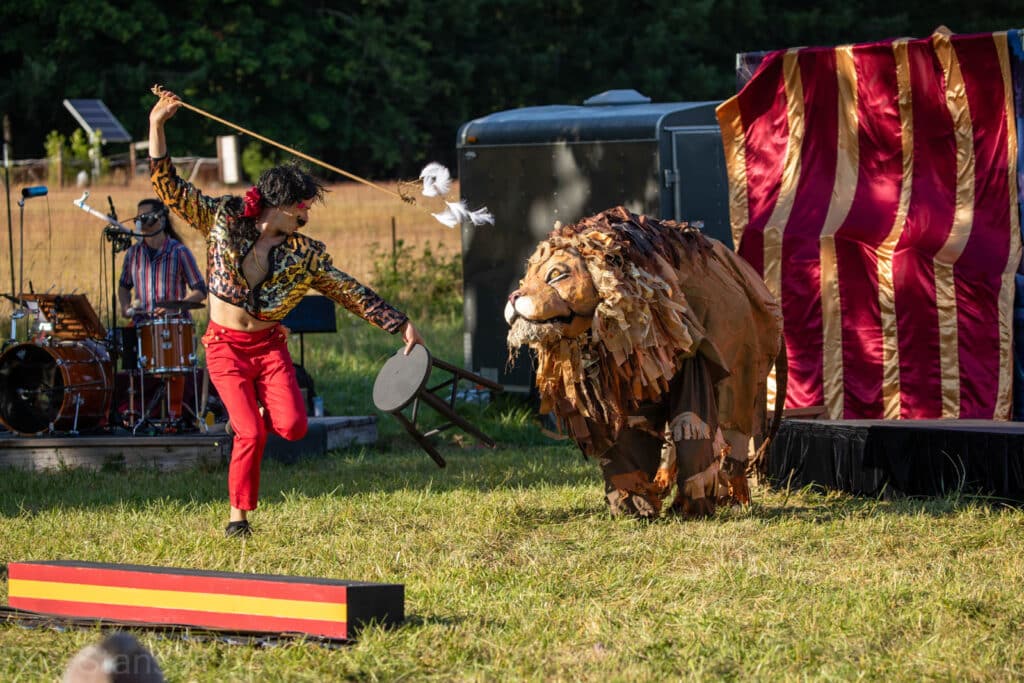 Alameda Post - Ship of Fools: A Giant Puppet Odyssey performance with a lion tamer and large puppet lion