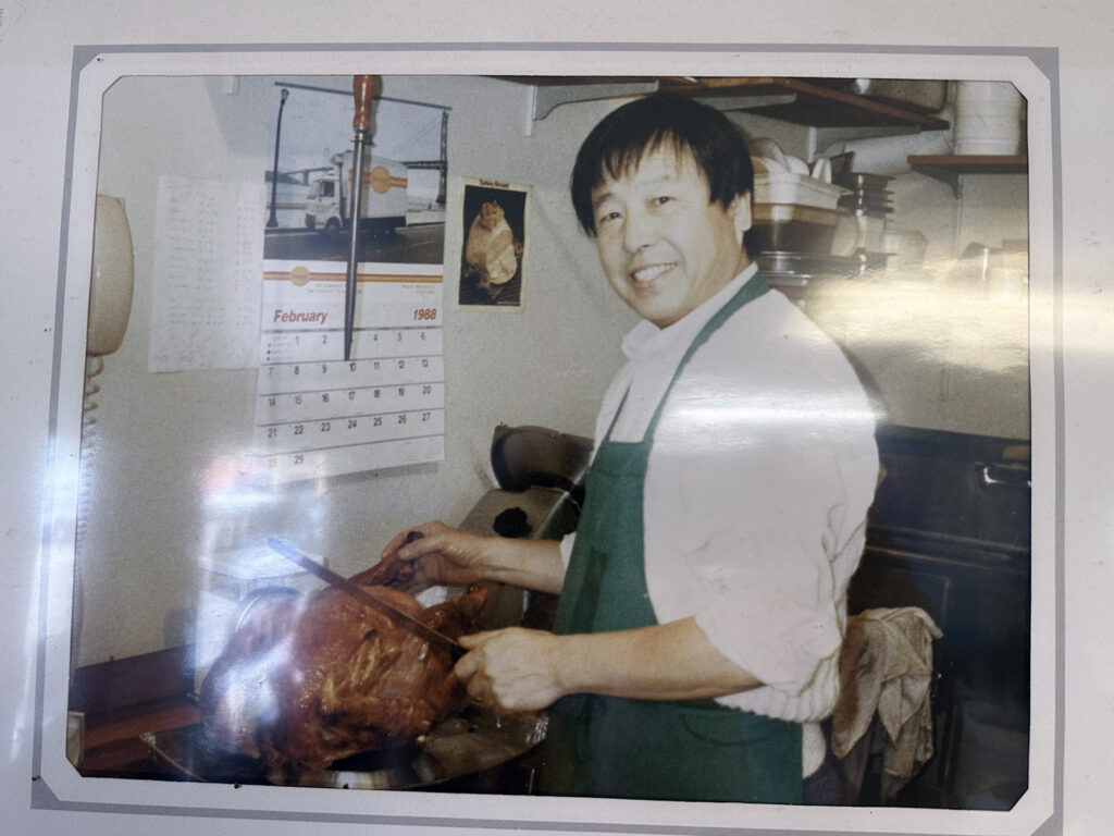 Alameda Post - A photo of a young Mike Lee carving a turkey
