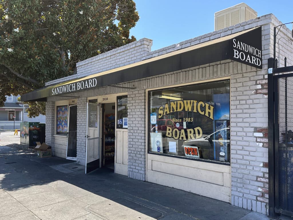 Alameda Post - the outside of Sandwich Board, a small one story brick deli building