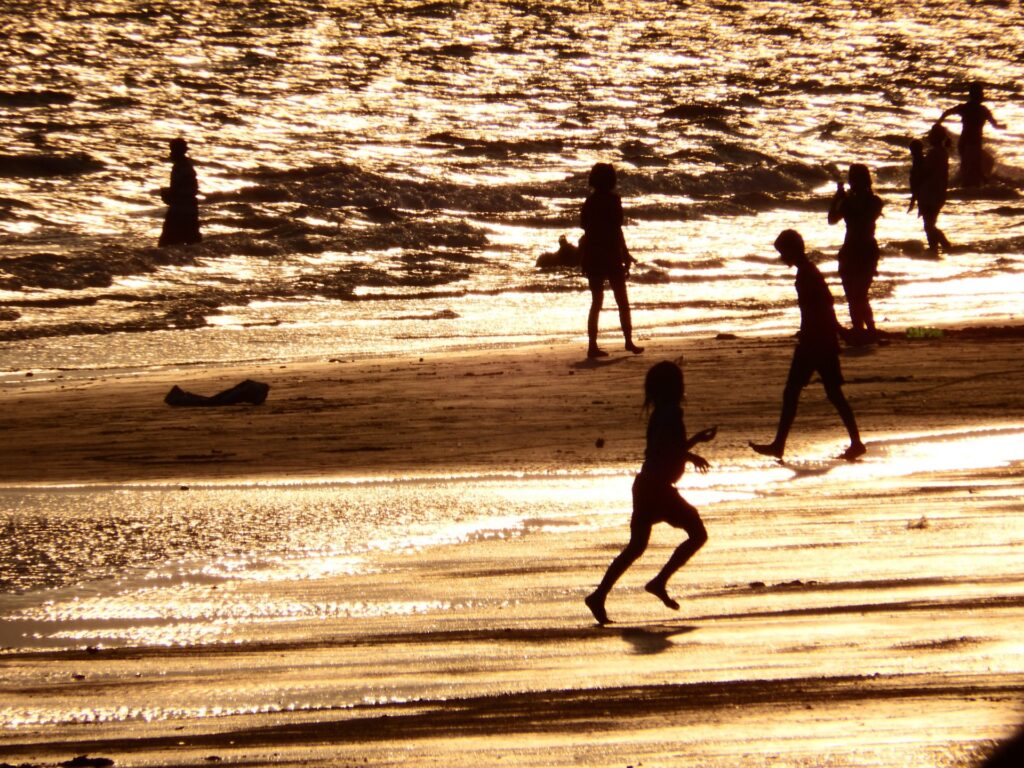 Alameda Post - Family playing on the beach