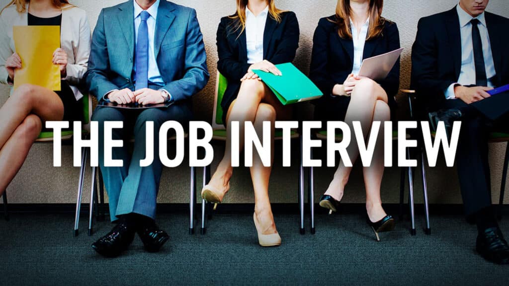 Alameda Post - a photo of people waiting with their resumes in hand and the words "The Job Interview"