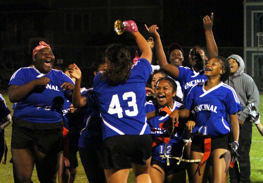 Alameda Post - players joyfully celebrate winning the Flag Football Island Bowl