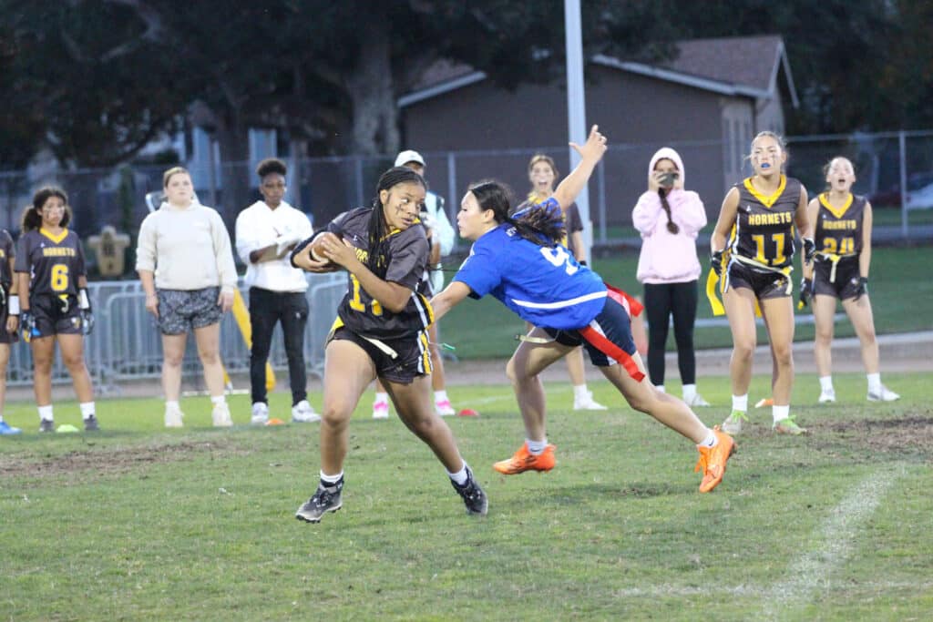 Alameda Post - two flag football players
