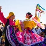 Alameda Post - two dancers at Fiesta Alameda 2023, November 4, 2023 at Radium Runway, produced by West End Arts District. Photo ©2023 Maurice Ramirez