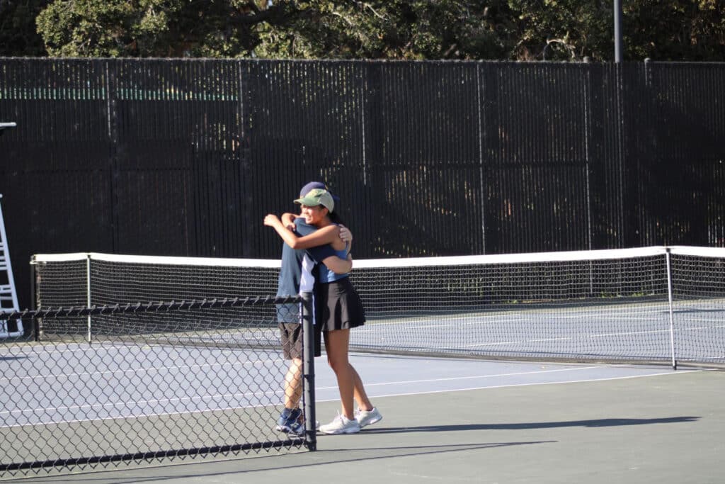 Alameda Post - Sofia Layzer hugs her coach