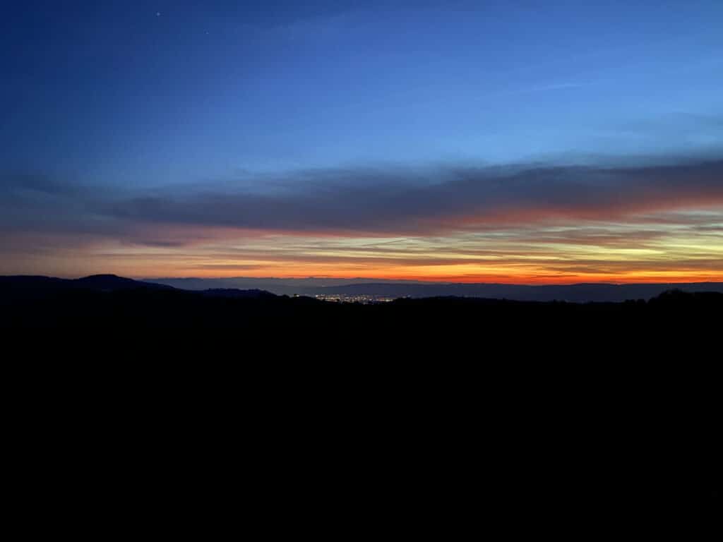 Alameda Post - blue, yellow, and orange sky at dusk in Henry W. Coe State Park