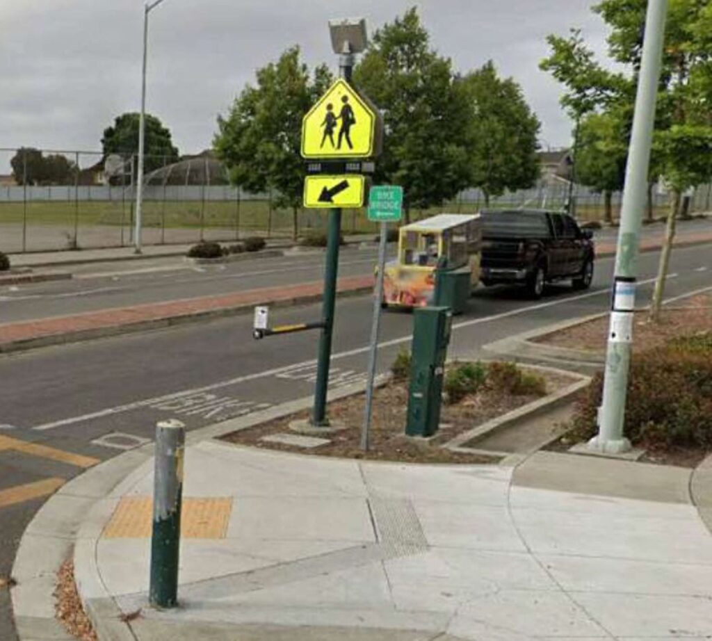 Alameda Post - a crosswalk with a flashing beacon