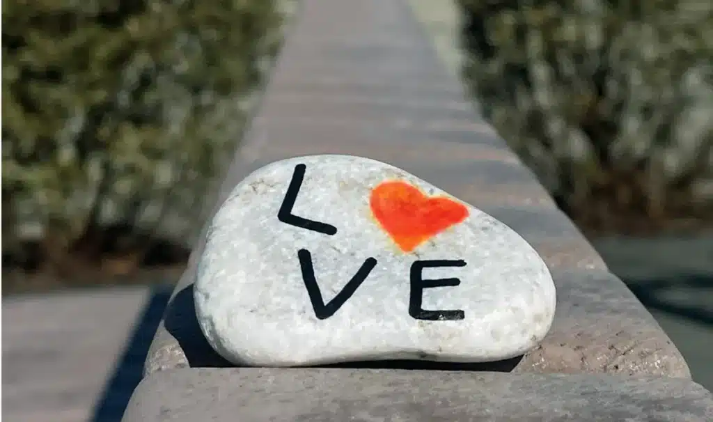 Alameda Post - Bear's-Eye View of Alameda for February 11, 2024. A painted rock that says L❤️VE