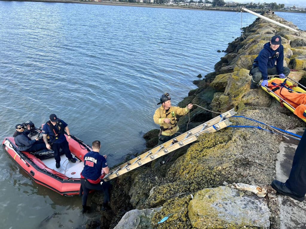 Alameda Post - AFD rescues a person on a rock wall. 