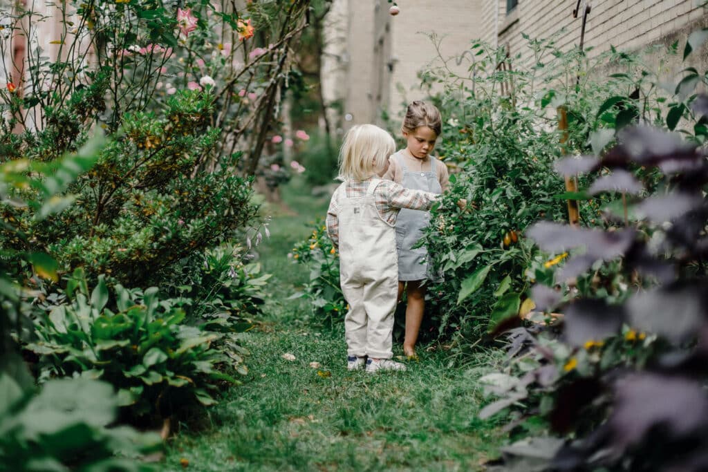 Alameda Post - two kids in a garden