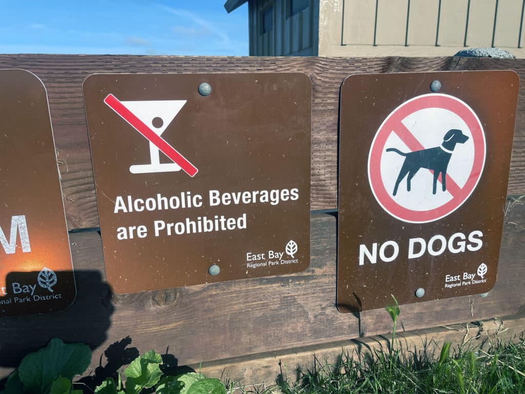 Alameda Post - beach signs prohibiting alcoholic beverages and dogs