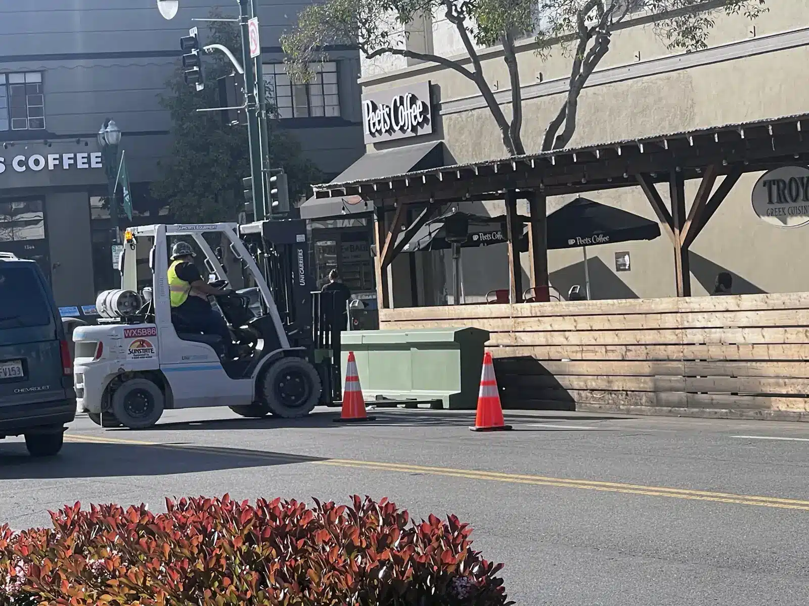 Alameda Post - Troy Restaurant parklet barricades being installed