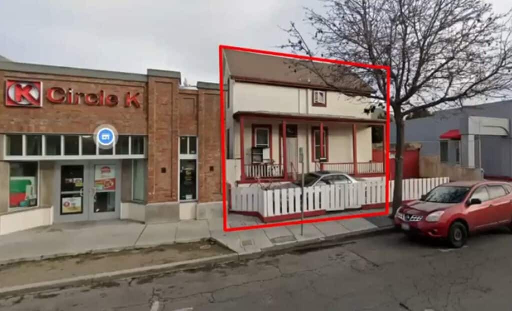 Alameda Post - a photo taken on Webster Street. A home is located next to a convenience store