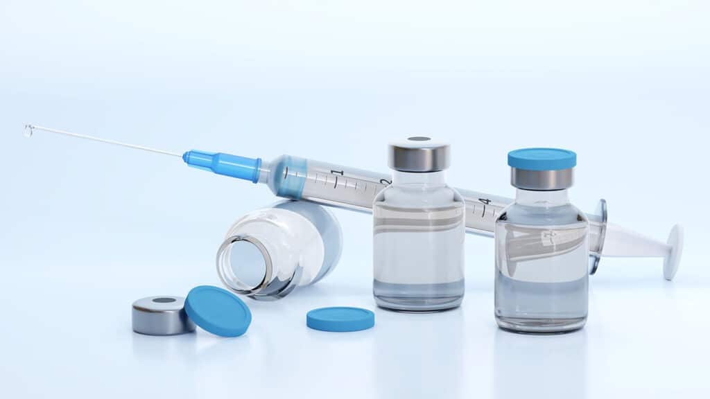 Alameda Post - vaccine bottles and syringe 