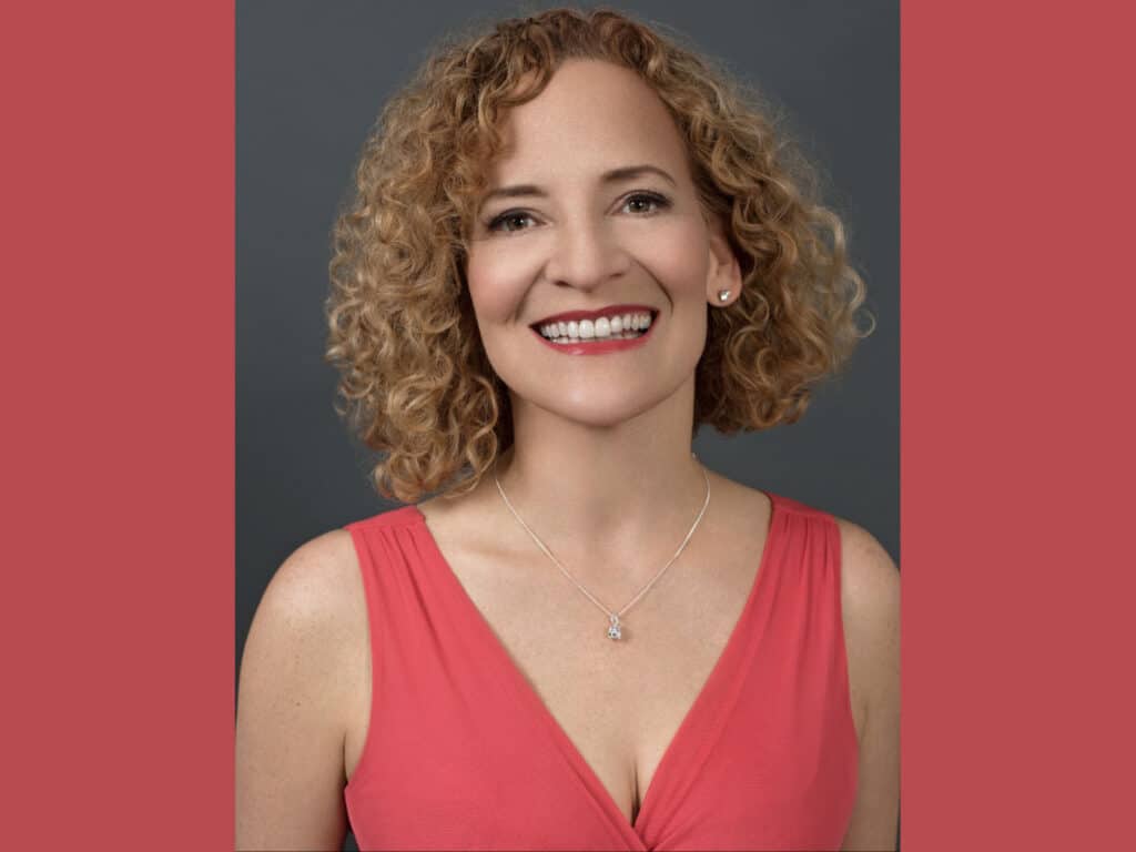 Alameda Post - Eileen Meredith smiling in a headshot photograph