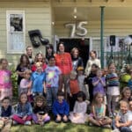 Alameda Post - Mayor Marilyn Ezzy Ashcraft surrounded by a large group of children of all ages who attended Kiddie Kampus