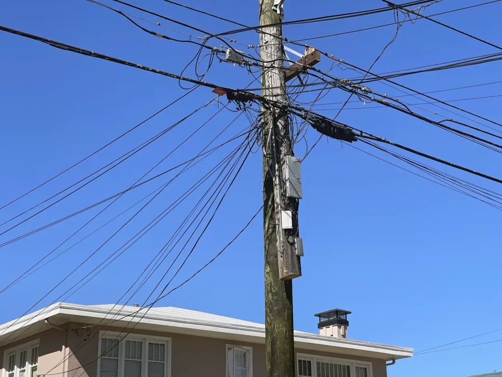 Alameda Post - a short piece of a previous utility pole attached to the new pole
