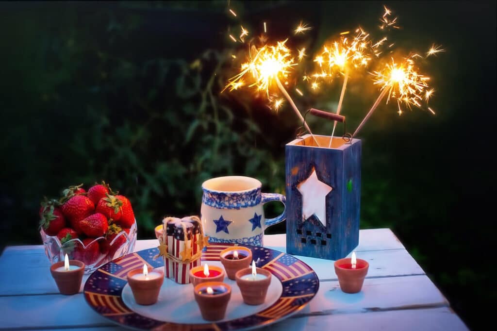Alameda Post - a table of red white and blue candles and decorations for the fourth of july